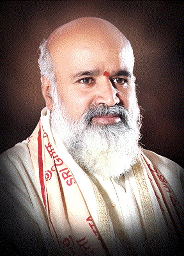 Guruji Rishi Prabhakar adorned with garland
